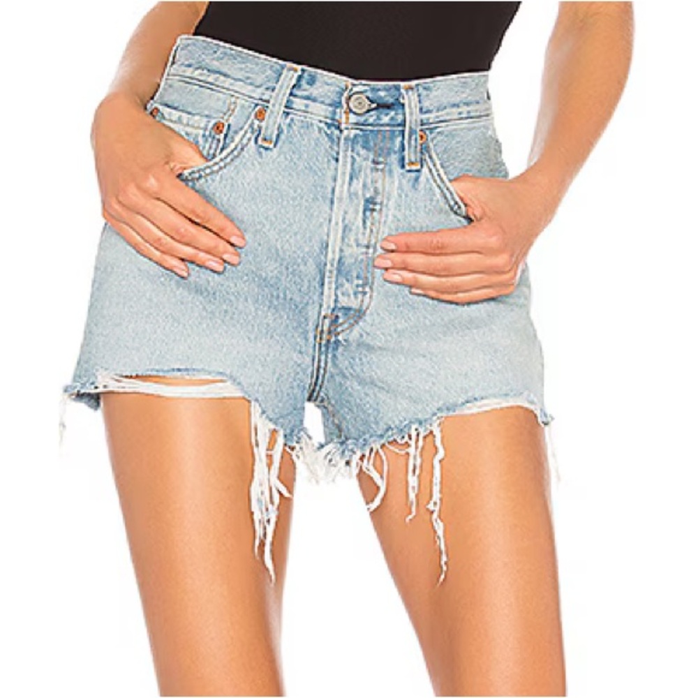 LEVI’S 501 Distressed Cut Off Denim Shorts in Guiding Light